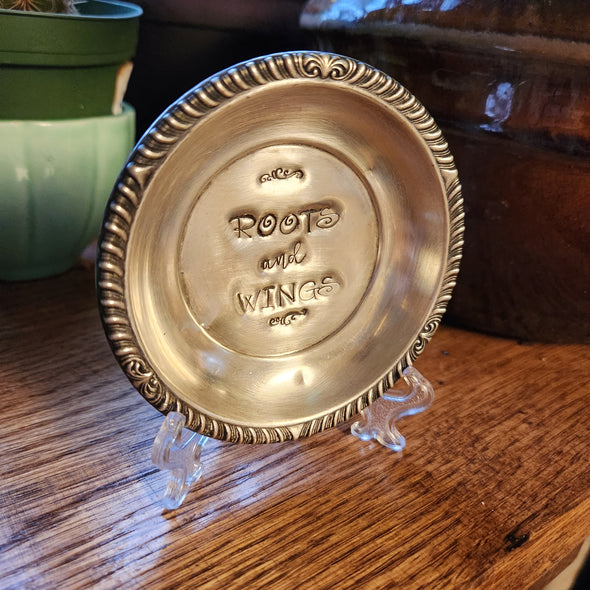 stamped silver plate dish - ROOTS  and WINGS